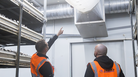 Container (8) Workers looking at refrigeration system